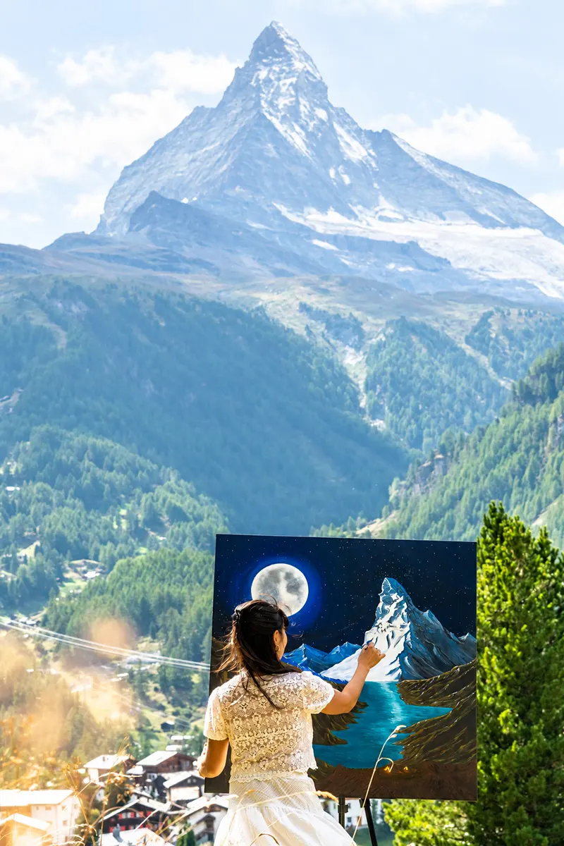 Lorraine Painting in front of Matterhorn mountain in Zermatt, Switzerland Lorraine Painting in front of Matterhorn mountain in Zermatt, Switzerland